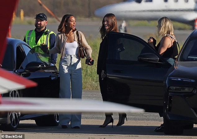 Zoe was animated as she chatted with friends ahead of the concert