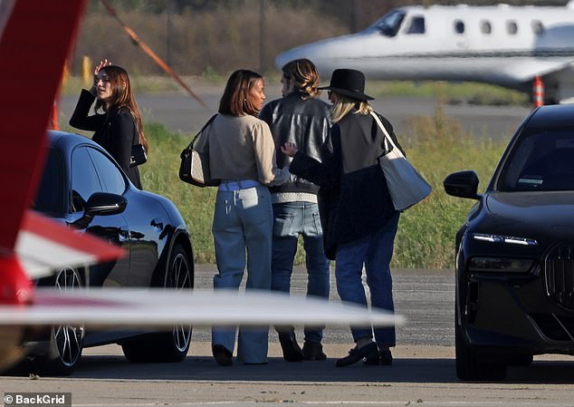 The clan chatted as they all gathered at the airport