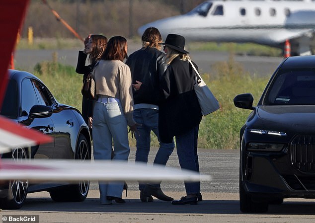 Everyone appeared delighted to be in eachother's company as they met up at the airport