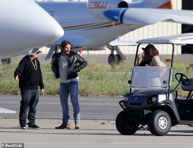 The jet setters enjoyed a chat on the tarmac