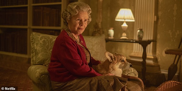 Imelda is seen with a corgi. The Queen - who owned many corgis throughout her life -