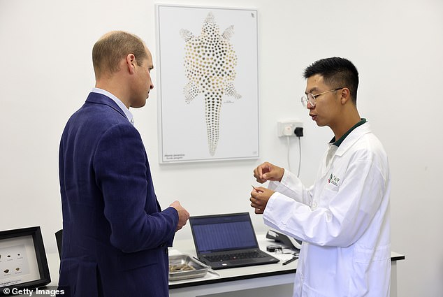 Prince William inspects seized items at the Centre for Wildlife Forensics in Singapore today