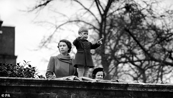 File photo dated 22/11/50 of Princess Elizabeth with her two year old son Prince Charles, watching the procession from the wall of Clarence House, as Queen Juliana and Prince Bernhard of the Netherlands drive to the Guildhall. Photos from every year of the King's life have been compiled by the PA news agency  to celebrate King Charles III's 75th birthday. Issue date: Sunday November 12, 2023. PA Photo. Prince Charles Philip Arthur George was born on November 14 1948 at Buckingham Palace - the first child of the future Queen Elizabeth and the Duke of Edinburgh. As the Prince of Wales, he was the nation's longest serving heir to the throne, and he became King on September 8 last year on the death of his mother, the late Queen. The King, who was crowned in May, was the oldest British monarch in history at a coronation. PA Photo. See PA story ROYAL Birthday Gallery. Photo credit should read: PA Wire