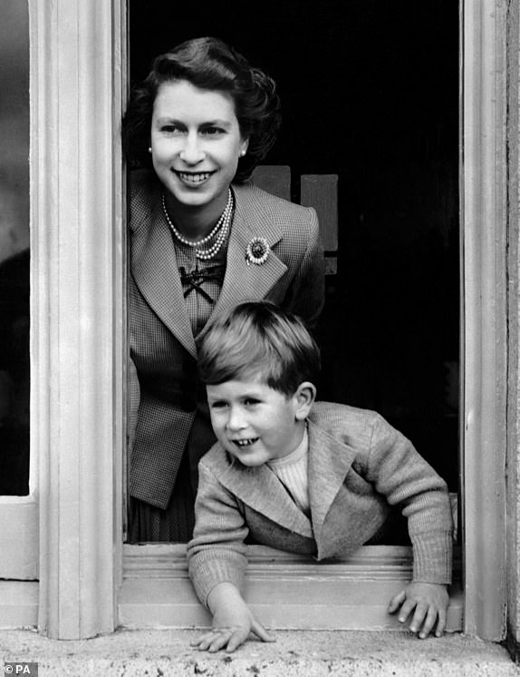 File photo dated 14/11/52 of Prince Charles keeping a look out on his fourth birthday, as he leans from a window with his indulgently smiling young mother, Queen Elizabeth II. Photos from every year of the King's life have been compiled by the PA news agency  to celebrate King Charles III's 75th birthday. Issue date: Sunday November 12, 2023. PA Photo. Prince Charles Philip Arthur George was born on November 14 1948 at Buckingham Palace - the first child of the future Queen Elizabeth and the Duke of Edinburgh. As the Prince of Wales, he was the nation's longest serving heir to the throne, and he became King on September 8 last year on the death of his mother, the late Queen. The King, who was crowned in May, was the oldest British monarch in history at a coronation. PA Photo. See PA story ROYAL Birthday Gallery. Photo credit should read: PA/PA Wire