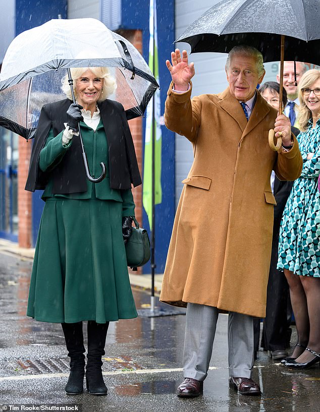 King Charles and Queen Camilla (both pictured) braved the rain today as the monarch celebrated a working birthday