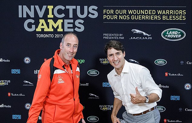 CEO Peter Lawless (pictured with Justin Trudeau) has left abruptly. Insiders claim he was sacked. Invictus says he was 'transitioned out' and will be an ambassador