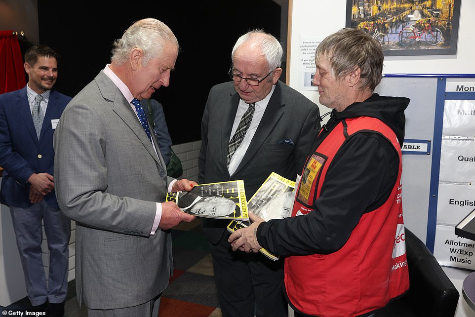 Among the many people he met there was Kelvin, who sells the Big Issue magazine, which is sold by homeless people to help them earn an income. Photos show the King greeting Kelvin, who is holding a stack of the magazines. The special edition features a black and white portrait of King Charles on the front cover. And dispelling the myth that royals never carry cash, photographs show Charles handing Kelvin a £10 note, to buy a copy. The King, who enjoyed a working birthday before private celebrations, laughed as he was treated to a rousing rendition of Happy Birthday to mark his three quarters of a century. Charles replied: 'Oh gracious!' after Baroness Louise Casey, who is helping to create his Coronation Food Project, asked whether he minded if guests serenaded him.