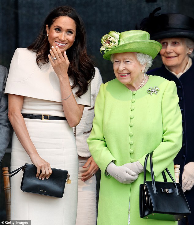 The Duchess of Sussex and Queen Elizabeth II pictured at a ceremony to open the new Mersey Gateway Bridge on June 14, 2018