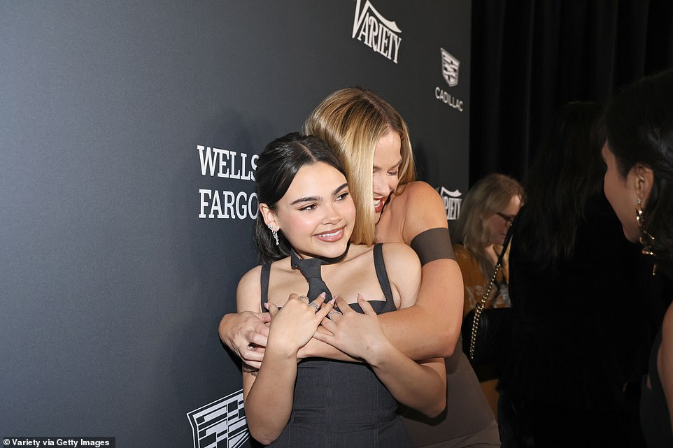 Adorable: Margot gave Ariana a warm hug