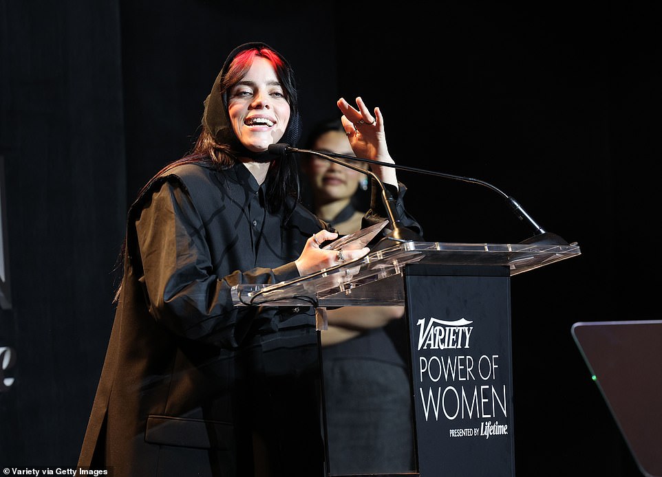 Eilish pictured speaking onstage