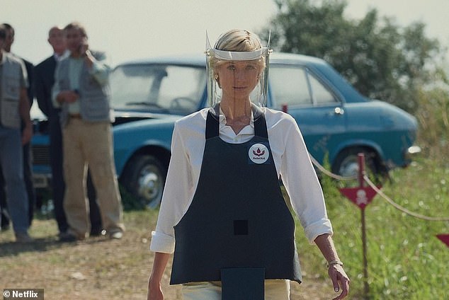 Viewers watch the famous moment Princess Diana walks through a minefield, while newspapers with photos of her and Dodi kissing are delivered to Balmoral