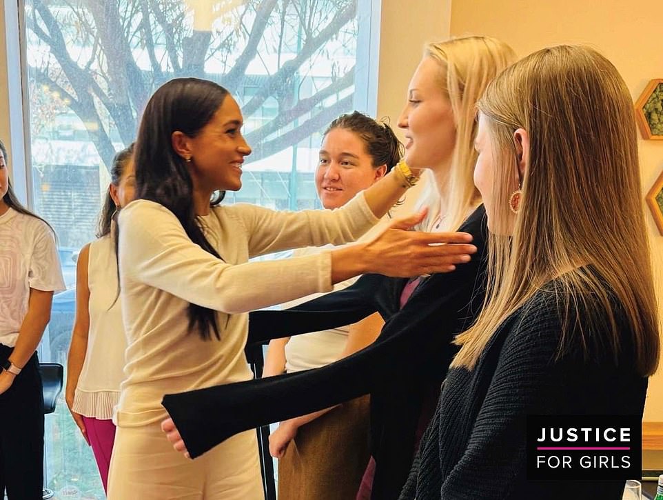 Wearing her hair down in a sleek, straight 'do the former actress opted for a low key natural make-up look pairing black eyeliner with a creamy pink lip. Taking to Instagram after the visited, Justice for Girls wrote: 'Justice for Girls was delighted to have a return visit from Meghan, The Duchess of Sussex. Joined by Jessica Lake and Lauri Thompson from the Lake family¿s All One Fund, we had an engaging and heartfelt conversation about justice and equality for teen girls living in poverty in Canada and around the world.'