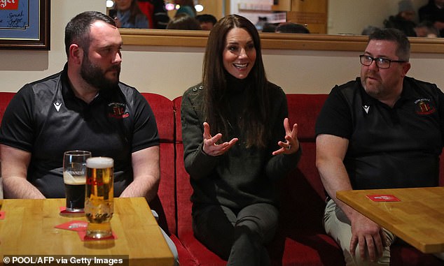 One of the team! The Princess of Wales chats to volunteers in the Dowlais Rugby Club