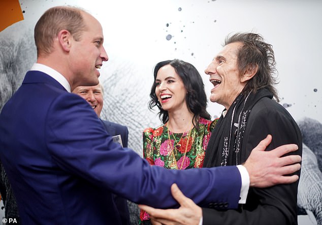 The Prince of Wales (left) speaks with Sally and Ronnie Wood at the 11th annual Tusk Conservation Awards at the Savoy Hotel