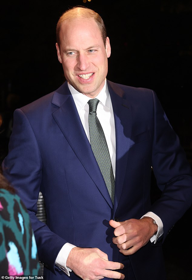 Will opted for a chic navy suit and printed tie as he arrived at The Savoy for the award ceremony