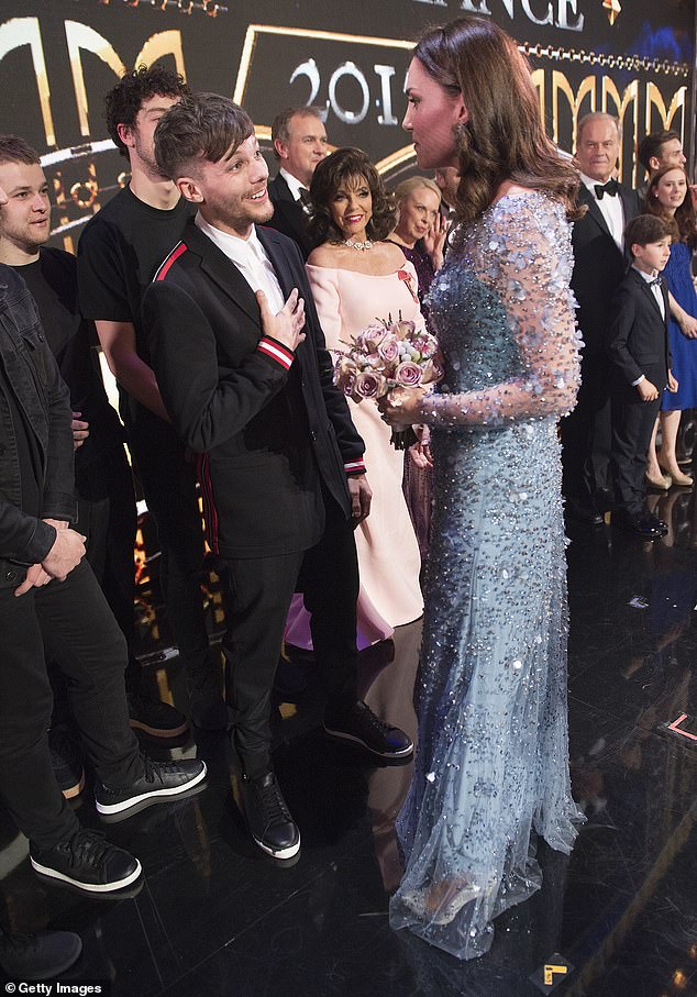 The Princess of Wales with One Direction star Louis Tomlinson on stage as they attend the Royal Variety Performance at the Palladium Theatre in November 2017