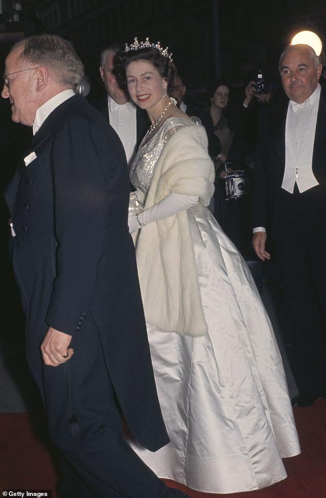 Queen Elizabeth II attends the Royal Variety Show at the Victoria Palace Theatre in May 1960