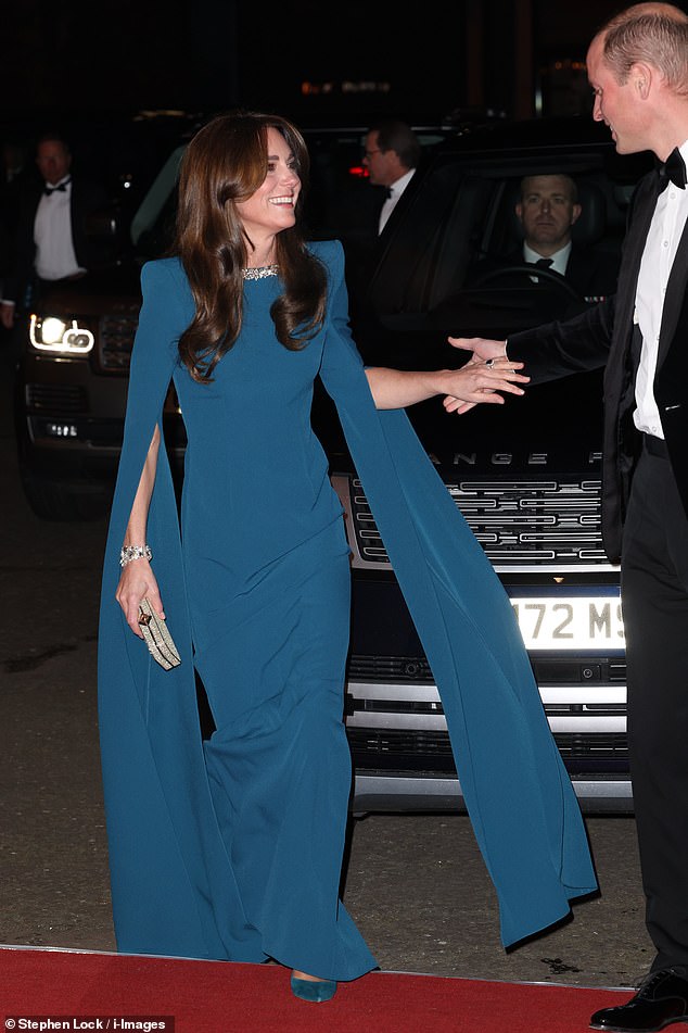 Prince William took his wife's hand in a show of chivalry as the pair walked along the red carpet to attend the Royal Variety Performance