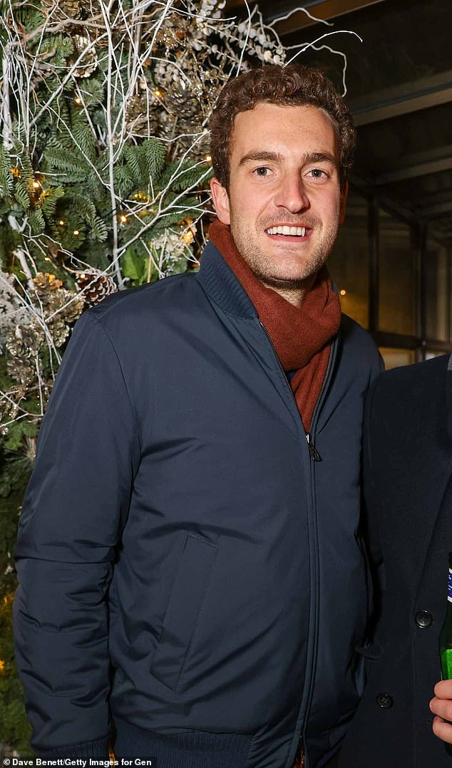 Peregrine Pearson (pictured in December 2021) - dubbed Britain's 'most eligible bachelor' - was spotted kissing Sophie Turner in Paris on Saturday