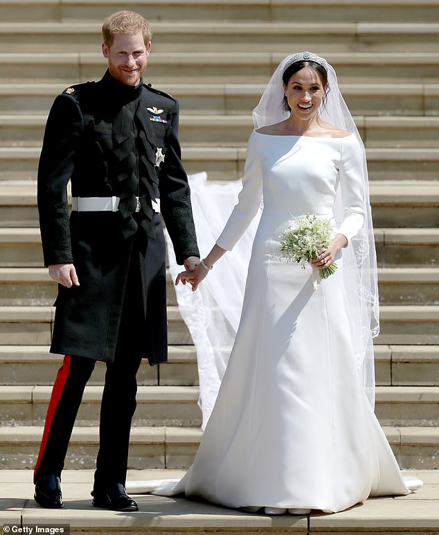 Prince Harry and Meghan Markle at their wedding in May 2018. One leading journalist claimed Sunday he thinks the couple's marriage will be measured in 'years, not decades'