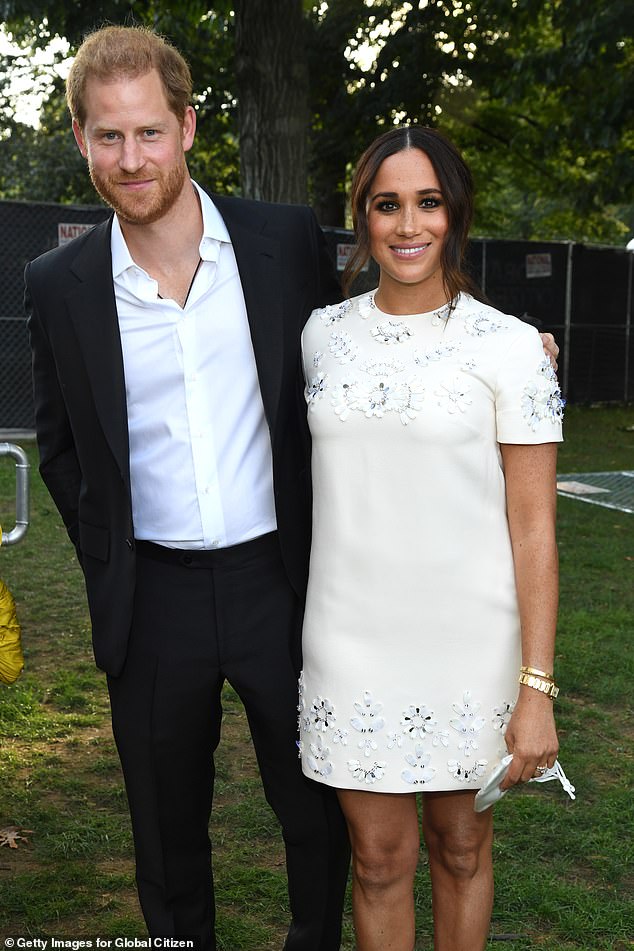 The Dutch edition of Mr Scobie's book named the two royals Meghan (pictured with Harry in September 2021) allegedly accused of having 'concerns' over 'how dark' Prince Archie would be, which was followed up by Piers Morgan last night identifying them on live television