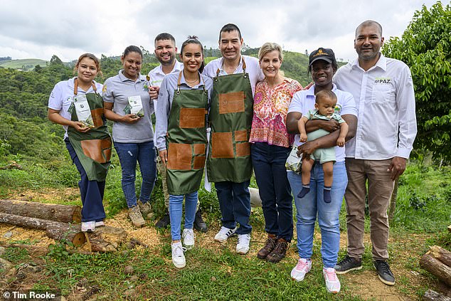 Sophie posed with some the Trópicos Fruits of Hope Coffee Farm workers in Cali