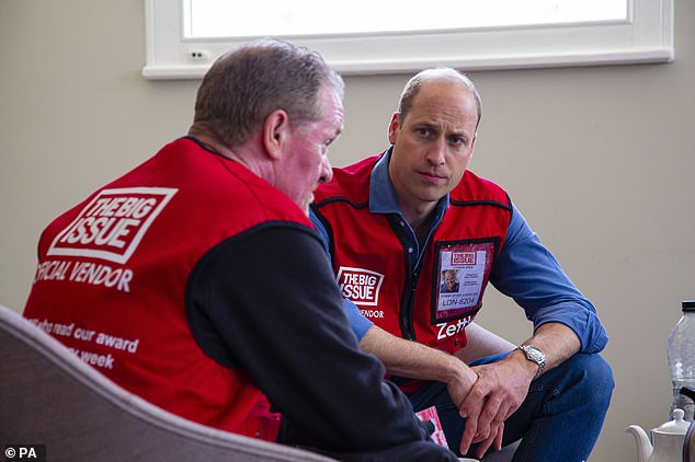 Prince William - then the Duke of Cambridge (right) - speaking to Big Issue vendor Dave Martin in 2022