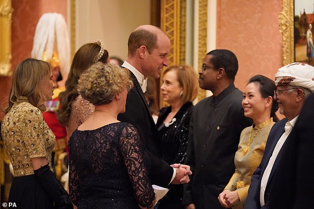 William looked dapper in a black tuxedo dinner jacket, which he paired with a classic white bow tie