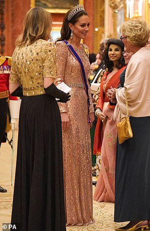 Kate donned the Cambridge Lover's Knot tiara, which was once owned by Prince William's mother Princess Diana