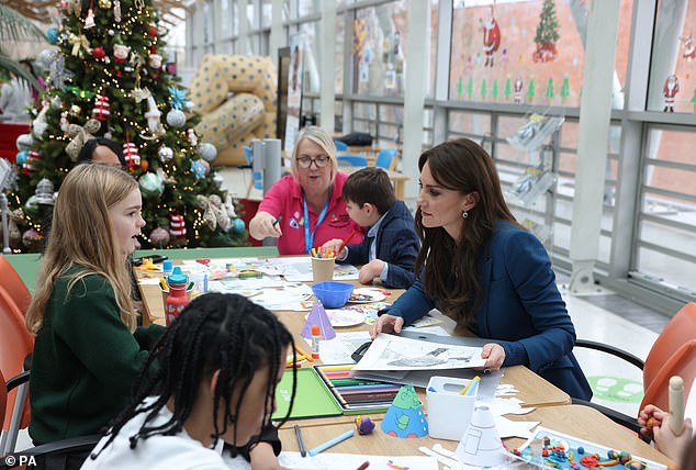 Kate reunited with Tony, nine, who she previously spent 'ages' chatting to at her caroll concert