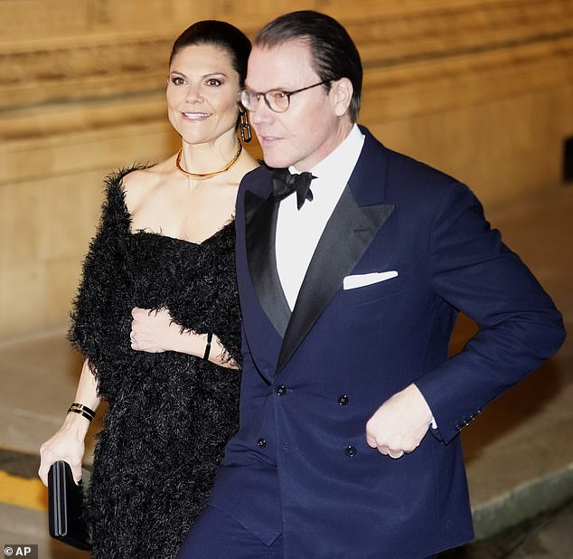 The couple appeared to be in high spirits as they arrived at the event at the Royal Albert Hall tonight