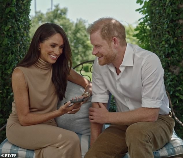 The Duke and Duchess of Sussex surprised fans in August with a video in which they call young inspirational people to congratulate them on their work - and Meghan opted for a sleek tan dress