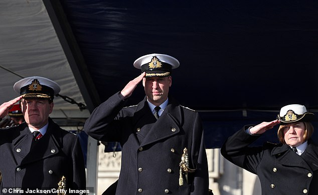 William pictured mid-salute as he made an appearance at the college amid The Crown's sensational finale