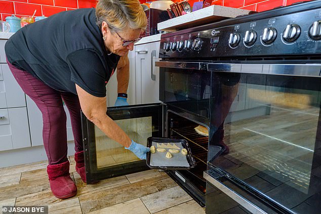 Jackie pops the Royal Christmas creations into the over to bake before a spectacular reveal