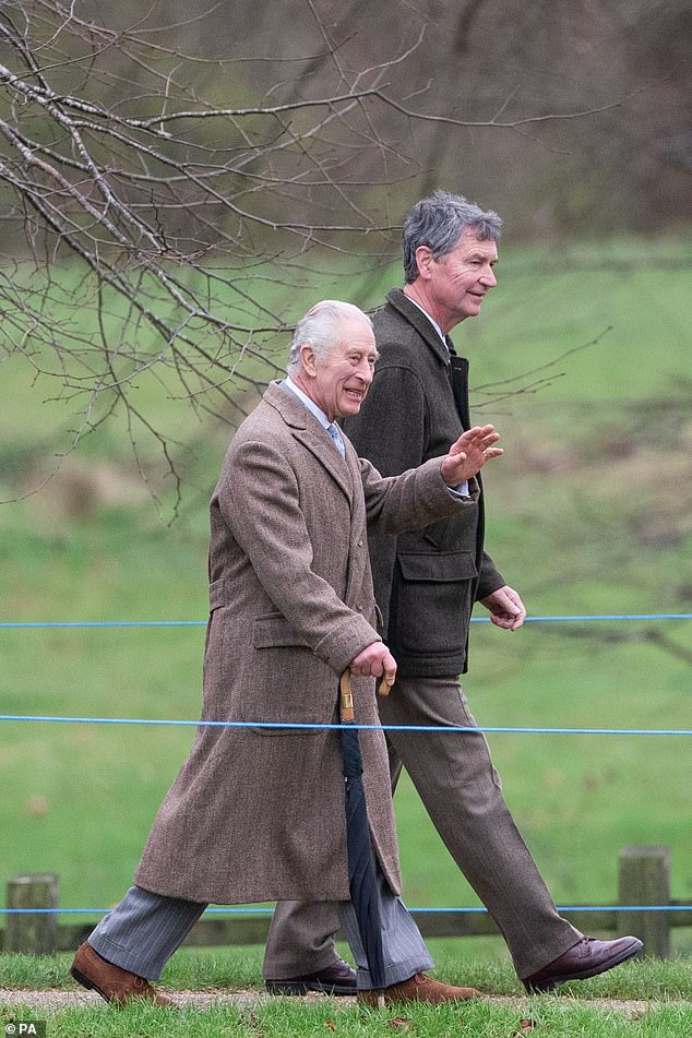 The king donned a slate grey pinstripe suite and brown suede brogues for the Christmas Eve outing