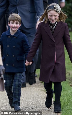 Cousins at Christmas! The pair walked hand in hand together