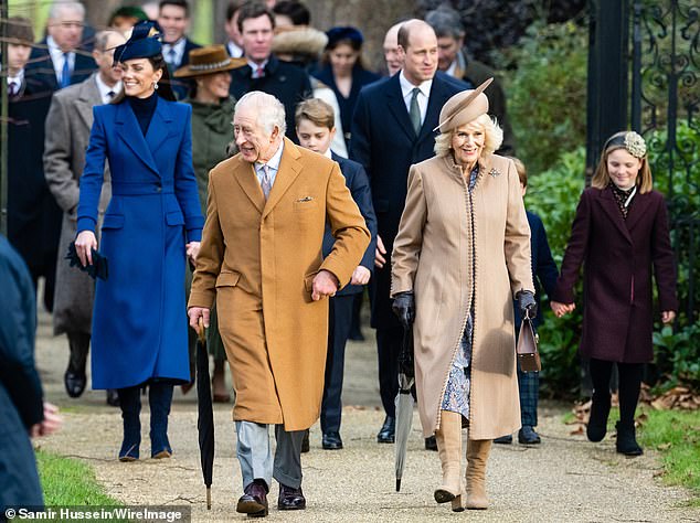 The king and queen walked side by side as they headed into the church