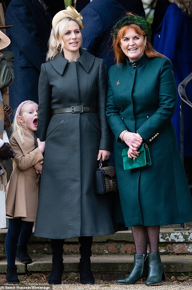 Sarah Ferguson surveys the crowd with Zara Tindall and her daughter Lena