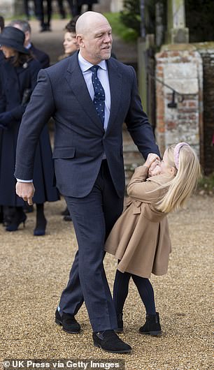 Cheeky Lena appeared to wrestle with her father