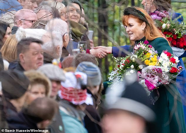 Sarah Ferguson greeting well wishers as she attends the Christmas morning service at Sandringham on December 25 2023