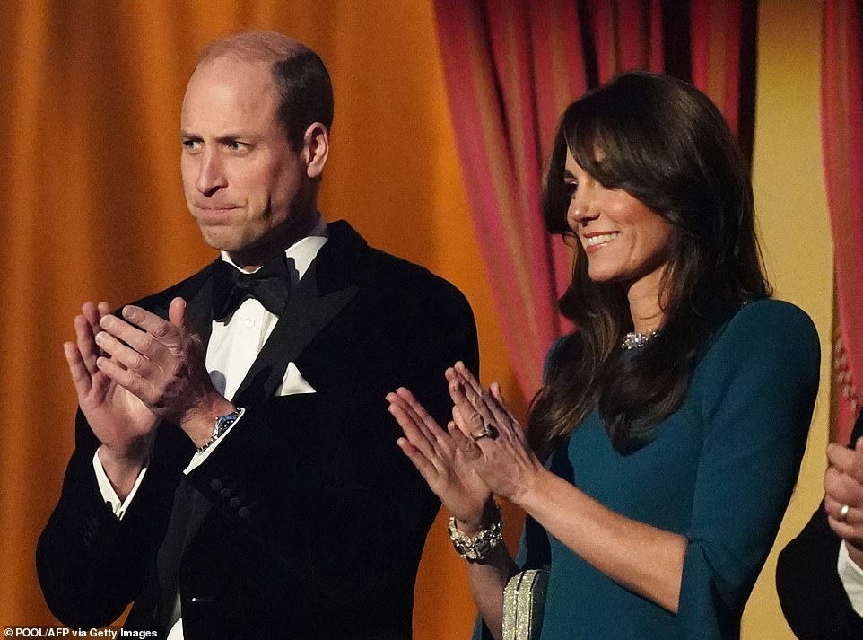 The Princess of Wales brushed off the fallout from a race row yesterday evening as she glistened in a show-stopping gown upon arrival at the Royal Variety Performance. Kate, 41, paired her stunning £1,288 Talina gown from Safiyaa with an equally dazzling smile as she stepped out in Kensington, showing no sign of anguish after a turbulent week for the royal family following the release of a bombshell book.