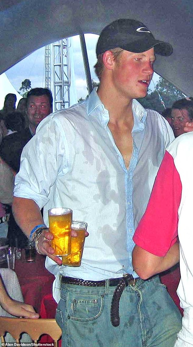 Prince Harry once tore a poster of his grandmother Queen Elizabeth off the wall of a club so she couldn't see his partying ways, TV presenter Paddy McGuinness has claimed. Pictured: Harry at Chinawhite club