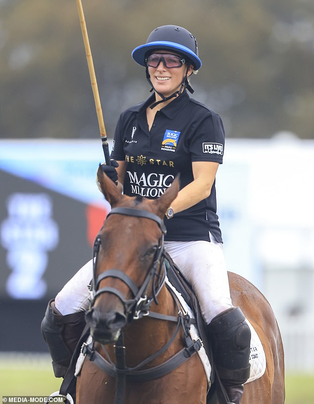 Zara was all smiles as she enjoyed a game of polo at today's event, which she attended with husband Mike