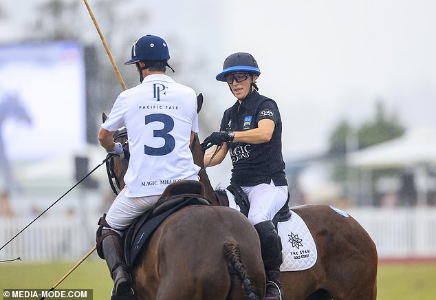 The King's niece appeared to have a quick chat with another rider during the game at today's outing