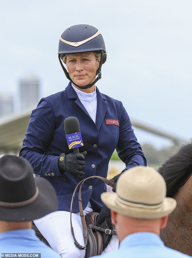 Zara held onto a microphone as she appeared to chat with guests at today's event in Australia's Gold Coast