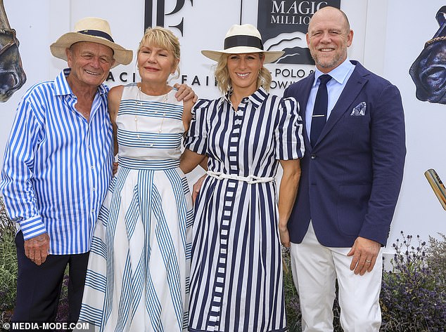 The couple smiled as they snapped a picture with the Australian businessman and his wife today