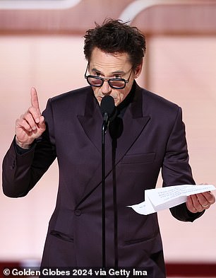 The 58-year-old actor began his acceptance speech with a joke at the podium as he said: 'Yeah, yeah. I took a beta blocker, so this is going to be a breeze'