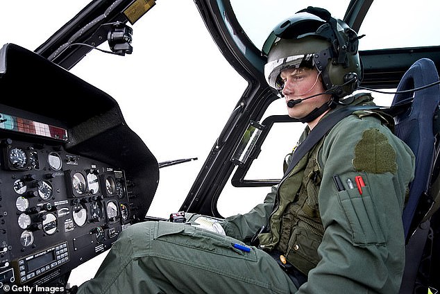 It is unclear whether the royal will attend the glitzy Beverley Hills ceremony to pick up the awards. Harry is pictured above learning to fly the Squirrel helicopter at the Defence Helicopter Flying School in 2009