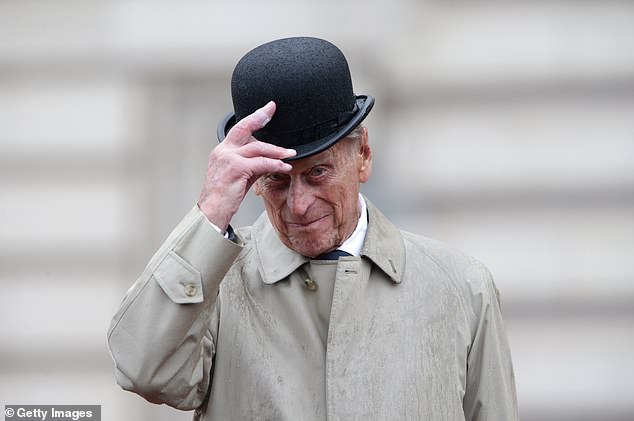 Prince Philip, Duke of Edinburgh raises his hat in his role as Captain General, Royal Marines