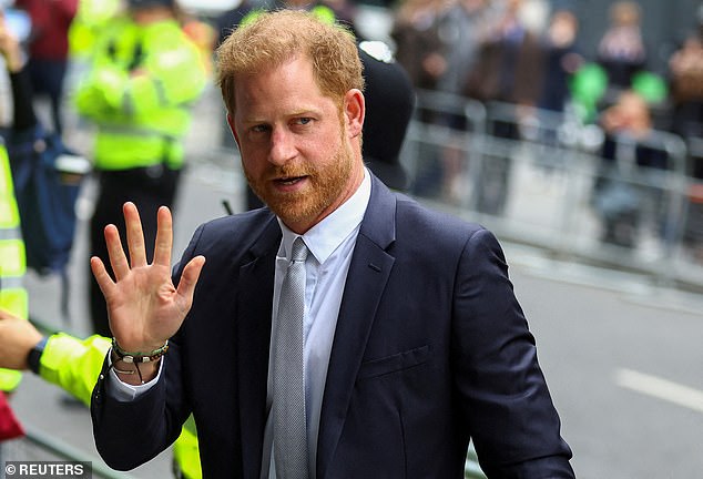 Prince Harry, Duke of Sussex walks outside the Rolls Building of the High Court in London